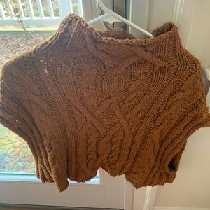 Free People sleeveless cropped sweater in a medium.